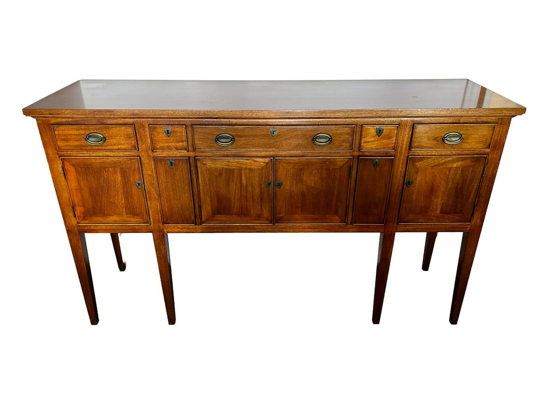 CRAFTIQUE MAHOGANY SIDEBOARD: CRAFTIQUE MAHOGANY SIDEBOARD Custom Hepplewhite Style Huntboard, by Craftique Furniture (Mebane, NC), with brass oval hardware and felt lined drawers, set on six square tapered legs, with five beaded