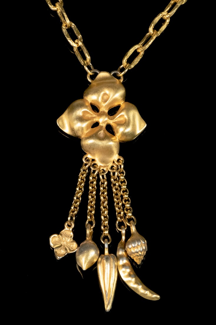 LINK NECKLACE WITH PENDANT: VINTAGE LINK NECKLACE WITH PENDANT Vintage Gold Tone Chain Link Necklace, with a central flower form drop pendant supporting five smaller chains with vegetable form ornaments, unmarked. Good condition
