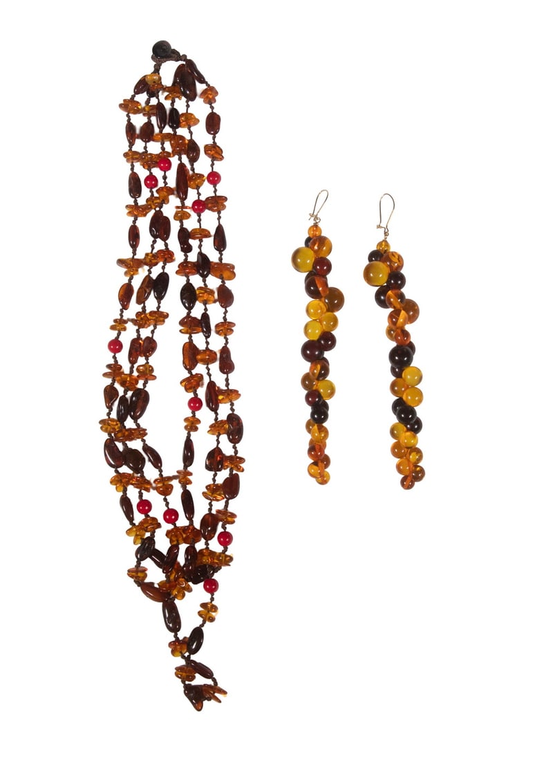 (2) VINTAGE AMBER JEWELRY: (2) VINTAGE AMBER JEWELRY Comprising a hand-knotted three-strand necklace of graduated amber beads in cognac and honey tones with occasional red accent beads, together with a pair of cluster-form ambe