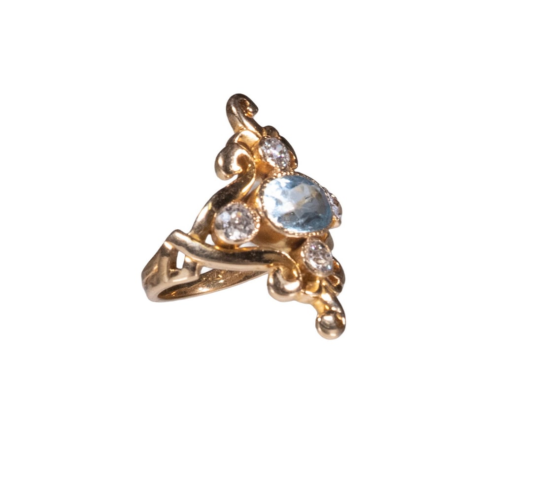 LATE VICTORIAN 18K GOLD AQUAMARINE AND DIAMOND RING: LATE VICTORIAN 18K GOLD AQUAMARINE AND DIAMOND RING Centering an oval-cut aquamarine measuring approximately 8.29 x 5.81 mm, accented by (4) old European-cut diamonds, each measuring approximately 3.5