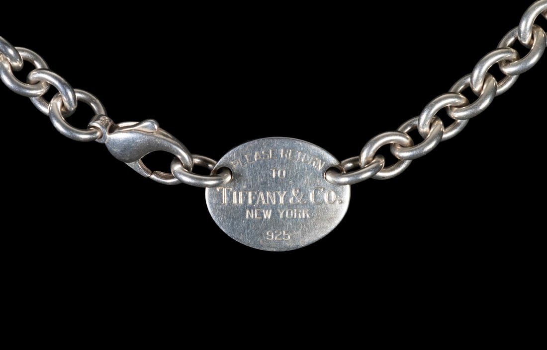 TIFFANY & CO. STERLING SILVER "RETURN TO TIFFANY" TAG CHOKER NECKLACE: TIFFANY & CO. STERLING SILVER "RETURN TO TIFFANY" TAG CHOKER NECKLACE A Tiffany & Co. sterling silver link chain necklace featuring the iconic "Return to Tiffany & Co., New York 925" tag, with lobster