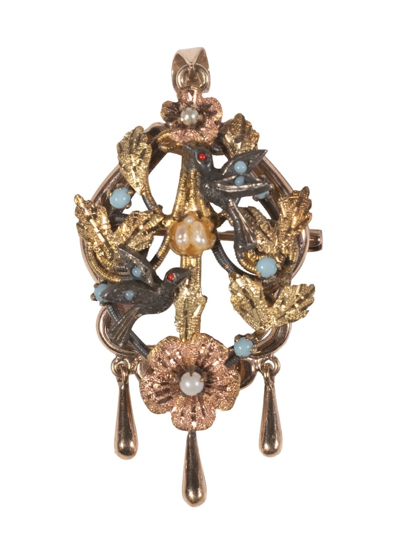 VICTORIAN 14K MULTI-COLOR GOLD AND SILVER BROOCH/PENDANT: VICTORIAN 14K MULTI-COLOR GOLD AND SILVER BROOCH/PENDANT Designed as an openwork floral and foliate wreath with two silver birds perched among textured yellow and rose gold blossoms and leaves, accent