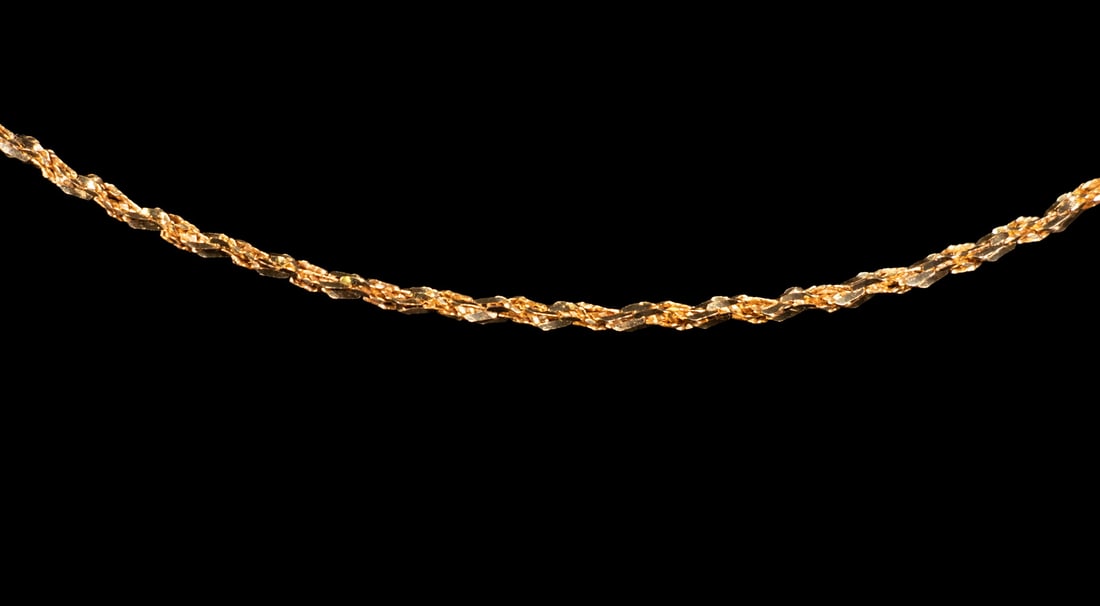 14K ITALIAN YELLOW GOLD ROPE CHAIN NECKLACE: 14K ITALIAN YELLOW GOLD ROPE CHAIN NECKLACE 14K yellow gold rope chain necklace, completed with a spring ring clasp. The chain features a tightly twisted rope-link design with bright polish. stamped 1