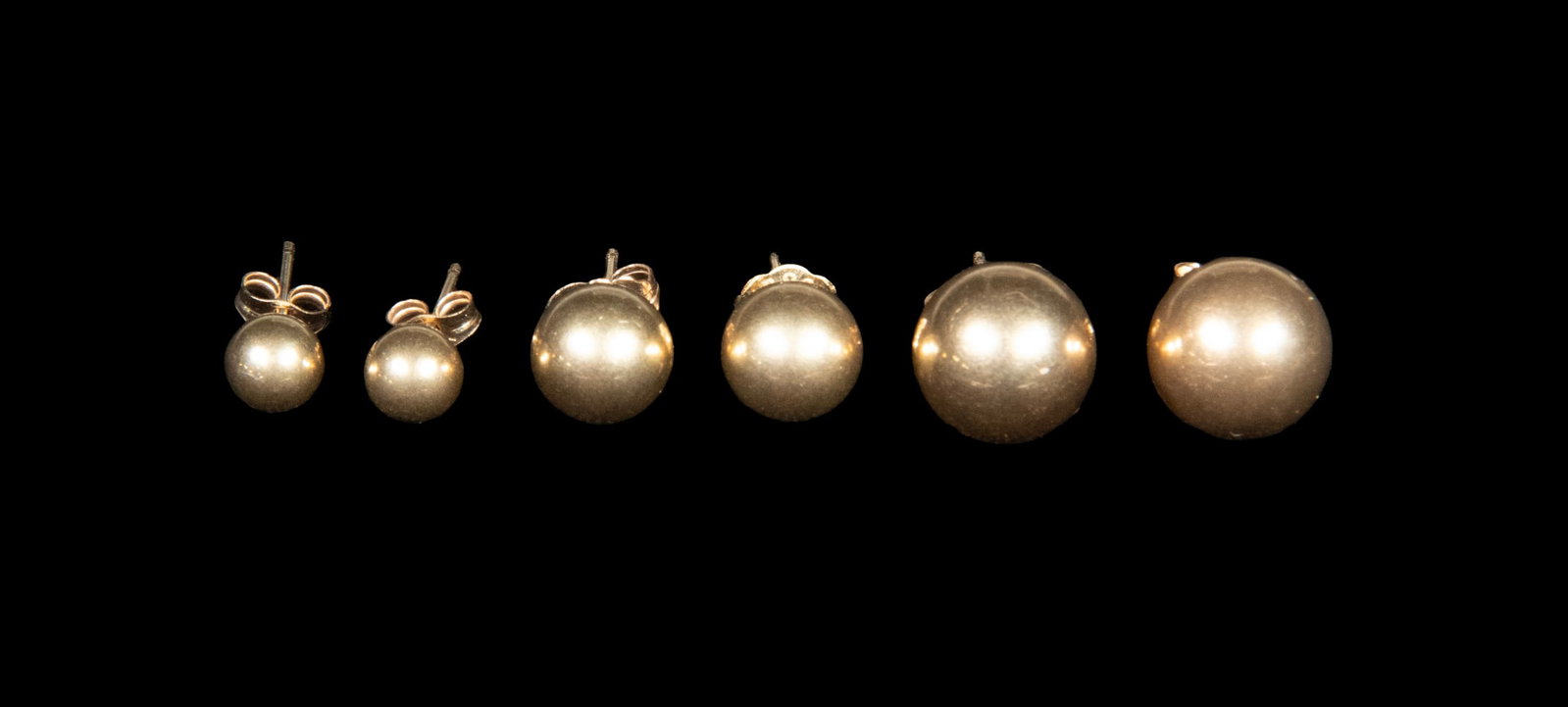 (3) PRS 14K GOLD BALL STUD EARRINGS: (3) PRS 14K GOLD BALL STUD EARRINGS Comprising three pairs of polished 14K yellow gold ball stud earrings in graduated sizes, approximately 5, 7, and 9 mm. Each fitted with post and butterfly