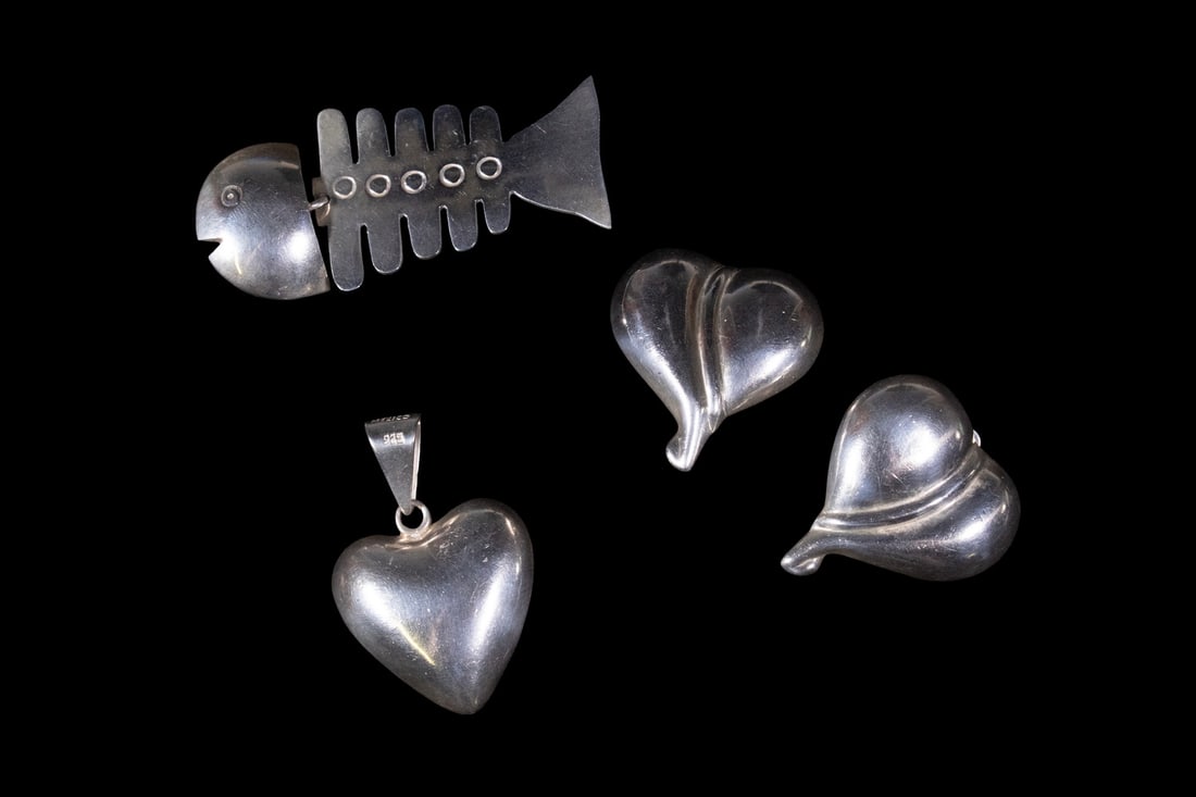 (3 PCS) VINTAGE TAXCO MEXICO STERLING JEWELRY: (3 PCS) VINTAGE TAXCO MEXICO STERLING JEWELRY Including: Articulated fish brooch, marked TM-142; Hollow heart shaped pendant, marked TV-21; and Pair of hollow heart shaped ear clips, marked "925", eac