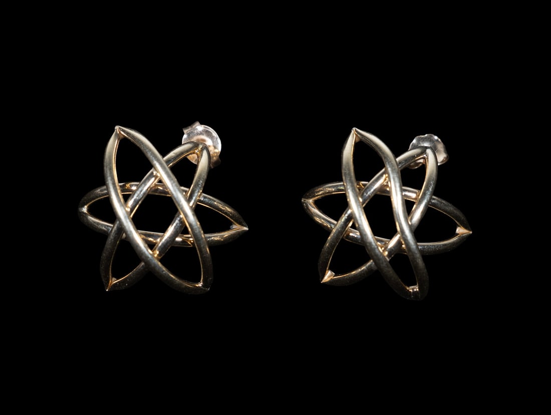 PR 14K GOLD ABSTRACT KNOT EARRINGS: PR 14K GOLD ABSTRACT KNOT EARRINGS A pair of 14K gold stud earrings designed as abstract openwork knot with intersecting polished gold elements in a sculptural modernist style. 1.8 dwt. tw. Overall go