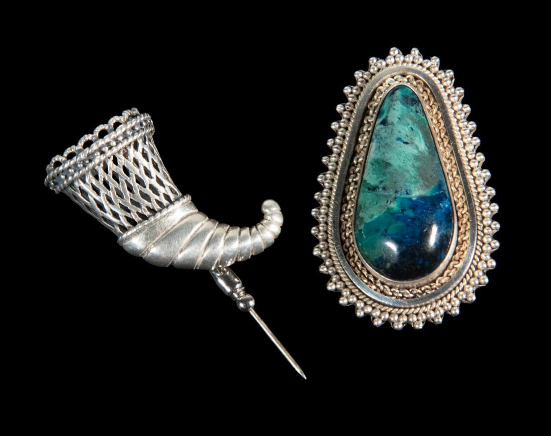 (2) VINTAGE STERLING SILVER BROOCHES: (2) VINTAGE STERLING SILVER BROOCHES Including: Israeli silver teardrop shaped pendant brooch, centered with a bezel set polished turquoise stone, surrounded by a fancy beaded edge; and a Cornucopia f