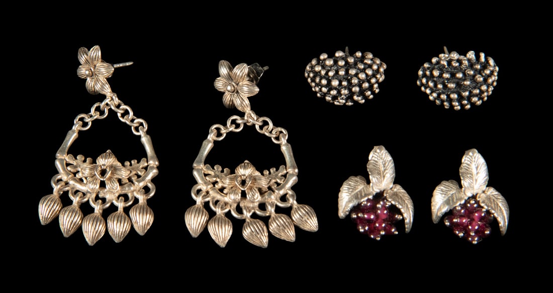 (3) PRS VINTAGE STERLING SILVER EARRINGS: (3) PRS VINTAGE STERLING SILVER EARRINGS A group of three pairs of sterling silver earrings in assorted styles. Including a pair designed as leaves with small purple garnet bead clusters, a pair of do