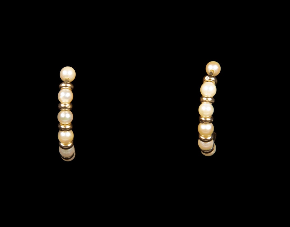 PR 14K GOLD PEARL HOOP EARRINGS: PR 14K GOLD PEARL HOOP EARRINGS Each hoop set with a row of (6) small pearls evenly spaced with gold spacer beads, forming a clean and balanced design. Mounted in 14K gold with post backs, stamped. 1.