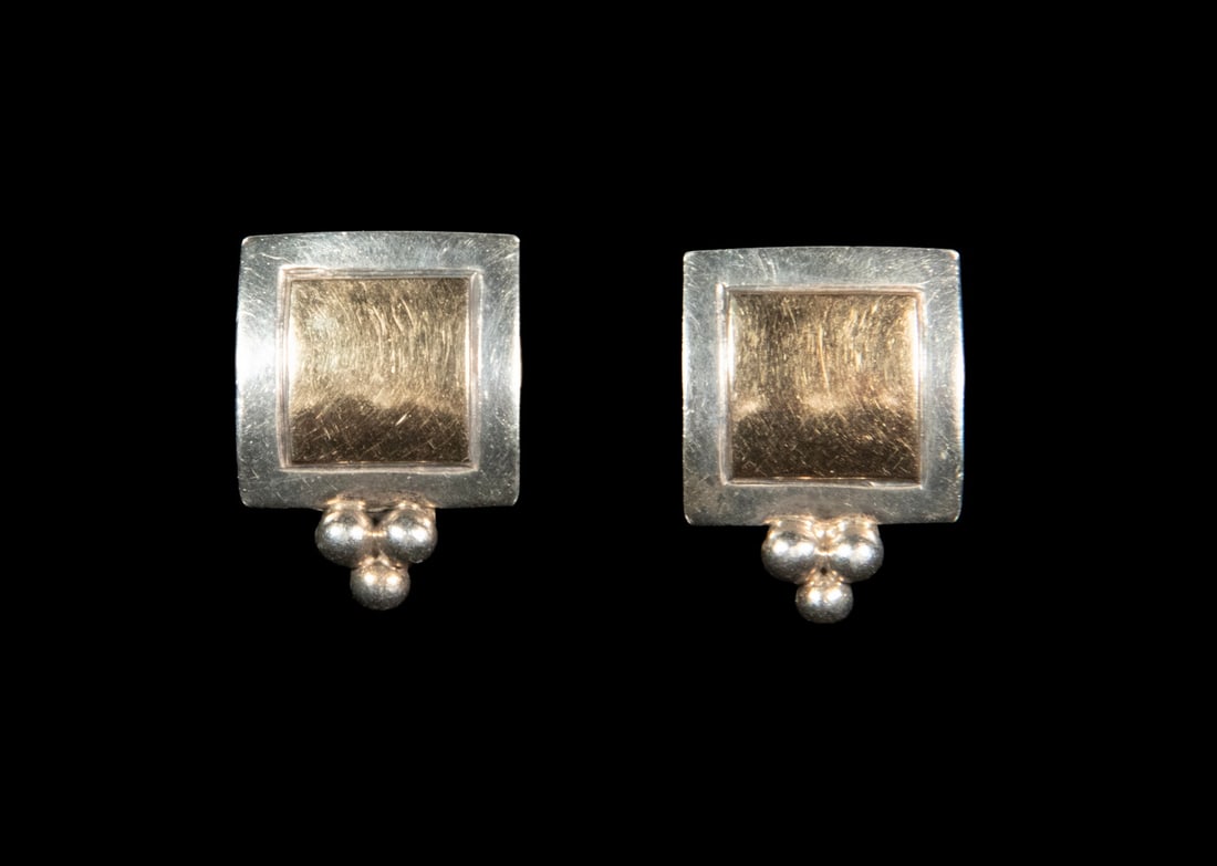 PR VINTAGE 14K GOLD AND STERLING SILVER CLIP EARRINGS: PR VINTAGE 14K GOLD AND STERLING SILVER CLIP EARRINGS Each designed as a square sterling silver frame centering a polished 14K gold panel, surmounted by a three-bead motif, with clip-back fittings,