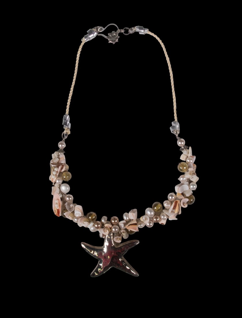 STUDIO COASTAL-STYLE SEASHELL, PEARL, AND STARFISH NECKLACE: STUDIO COASTAL-STYLE SEASHELL, PEARL, AND STARFISH NECKLACE Necklace featuring a polished silver starfish-form pendant suspended from a strand composed of assorted seashells, cultured pearls, shell