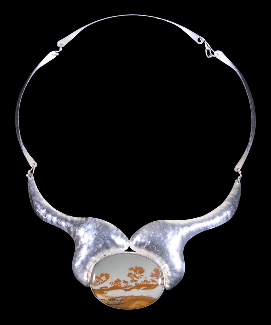 HAND MADE STERLING SILVER AND PICTURE JASPER NECKLACE: HAND MADE STERLING SILVER AND PICTURE JASPER NECKLACE A sterling silver necklace featuring a large oval picture jasper cabochon measuring approximately 38.74 x 28.73 mm, displaying natural landscape-l