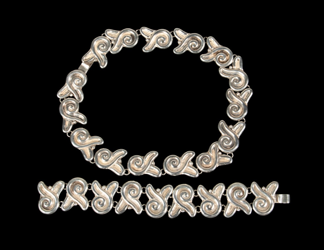 (2 PCS) MEXICAN TAXCO STERLING SILVER JEWELRY SET: (2 PCS) MEXICAN TAXCO STERLING SILVER JEWELRY SET A Mexican sterling silver necklace and matching bracelet composed of stylized scrolling links in an organic modernist design. Both pieces fitted with 
