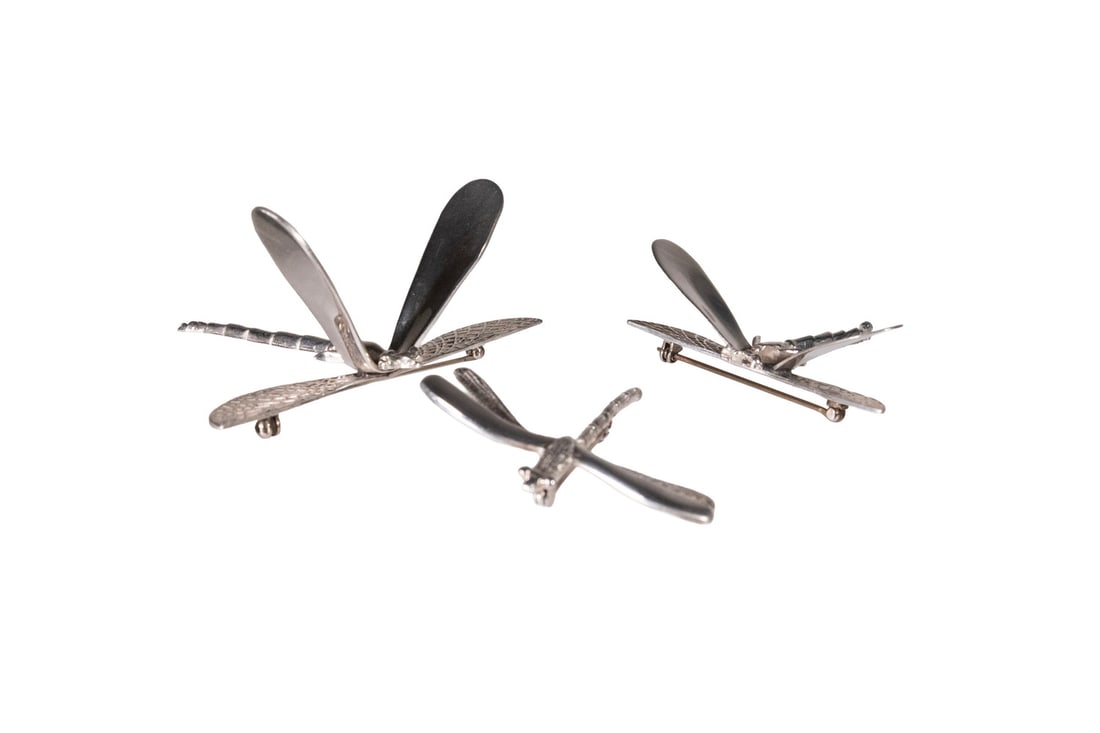 (3) MEXICAN STERLING DRAGONFLY PINS: (3) MEXICAN STERLING DRAGONFLY PINS Group of (3) Silver Brooches, the larger double-wing pins stamped "Mexico, 925", 1 3/4" x 2 1/4" and 2 1/2" x 3", and the smaller marked "925", 2" x 2"; 1.23 ozt tw