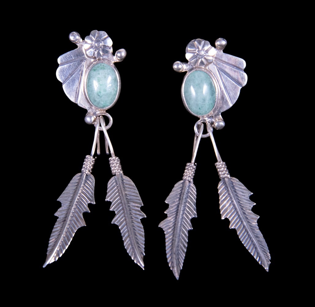 PR MEXICAN TAXCO STERLING SILVER AND AVENTURINE DANGLE EARRINGS: PR MEXICAN TAXCO STERLING SILVER AND AVENTURINE DANGLE EARRINGS A pair of Mexican sterling silver earrings, each set with an oval aventurine quartz cabochon, above stylized floral and fan-form element