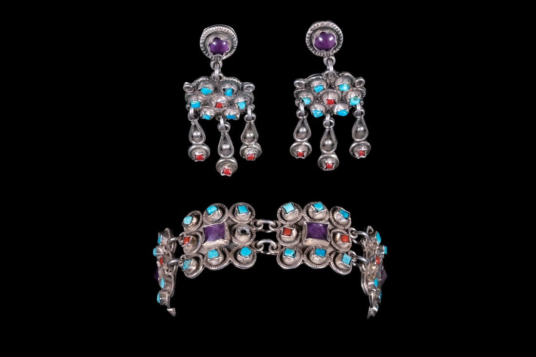 MEXICAN TAXCO STERLING SILVER, AMETHYST, TURQUOISE, AND CORAL JEWELRY SUITE: MEXICAN TAXCO STERLING SILVER, AMETHYST, TURQUOISE, AND CORAL JEWELRY SUITE A Mexican sterling silver jewelry suite, including a wide bracelet and a pair of pendant earrings, each set with amethyst, t