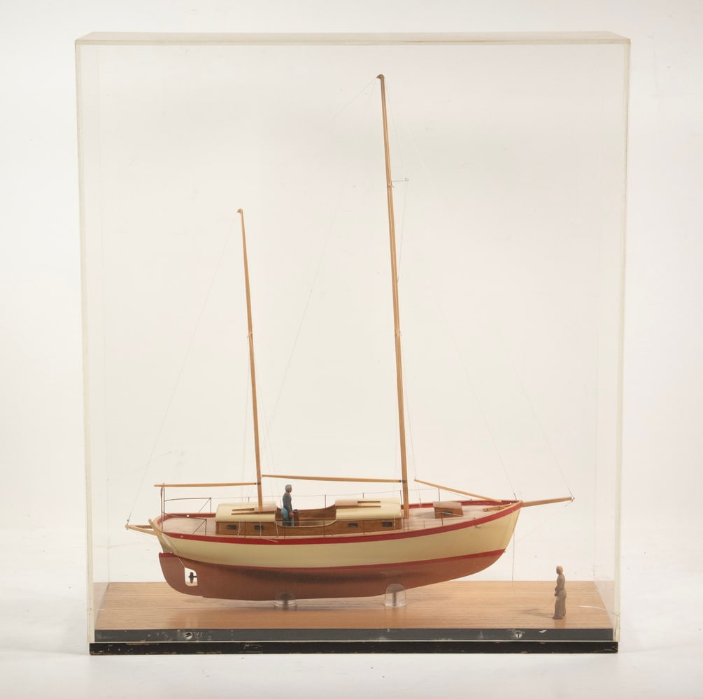 CUSTOM CASED MODEL OF BLUENOSE SCHOONER: CUSTOM CASED MODEL OF BLUENOSE SCHOONER Hand Mase Model of the Schooner in "drydock" with two men aboard and in the yard, mounted inside plexiglas case. OS: 24 1/2 x 21 1/2 x 7 1/2 in. (62.2 x 54.6 x
