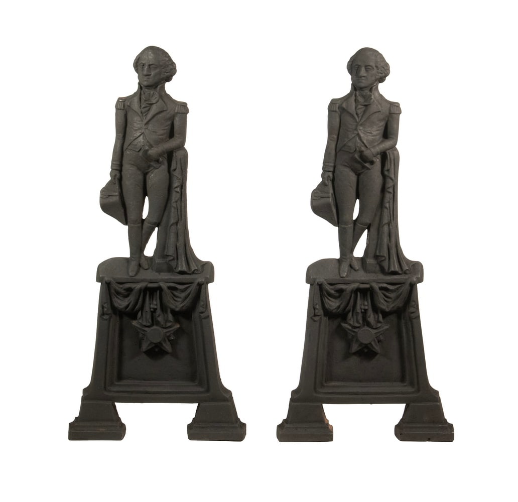 CIRCA 1840 GEORGE WASHINGTON 'CAMPAIGN' ANDIRONS: CIRCA 1840 GEORGE WASHINGTON 'CAMPAIGN' ANDIRONS Heavy cast iron with channel lock dogs, featuring standing figures of our first President in uniform, standing on an architectural plinth. Size: 20 1/2