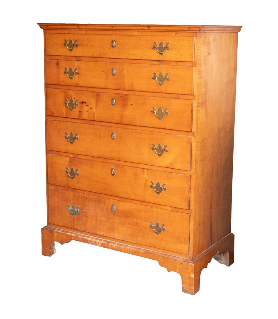 18TH C. TIGER MAPLE CHIPPENDALE CHEST: 18TH C. TIGER MAPLE CHIPPENDALE CHEST American, dovetail joined top with applied molded edge, graduated drawers with molded edge, pine secondary, butterfly drop bail brasses with octagonal lock escutc