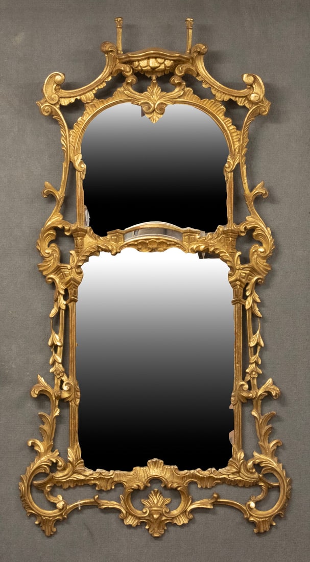 CHIPPENDALE CARVED MIRROR: CHIPPENDALE CARVED MIRROR Custom Giltwood Mirror, in a pierced delicate trailing vine and floral design. OS: 58 x 27 in. (147.3 x 68.6 cm.)