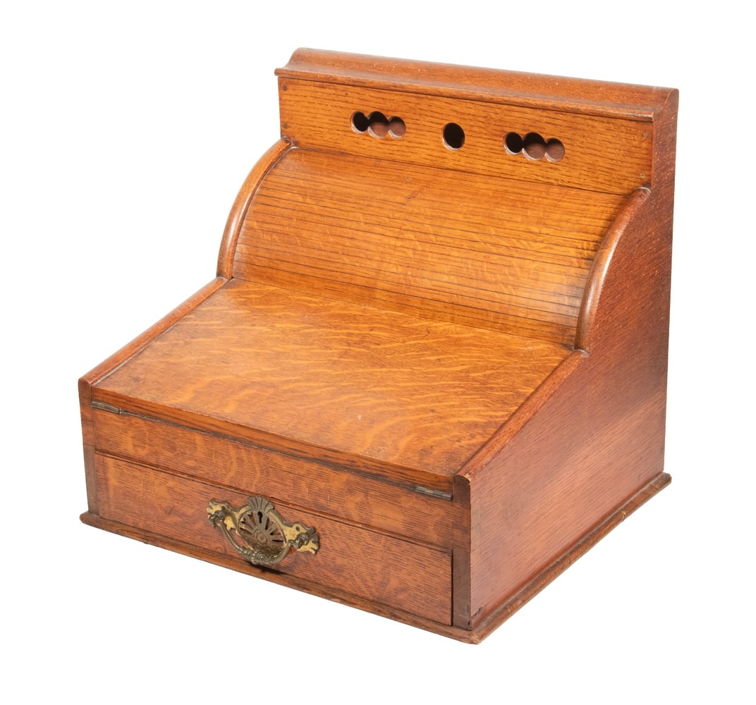 VICTORIAN ENGLISH OAK TAMBOUR TOP WRITING BOX: VICTORIAN ENGLISH OAK TAMBOUR TOP WRITING BOX Circa 1900 Desk Top Letter Cabinet, having a tambour top concealing letter slots and compartments for pens and ink bottles, hinged lid that folds open to