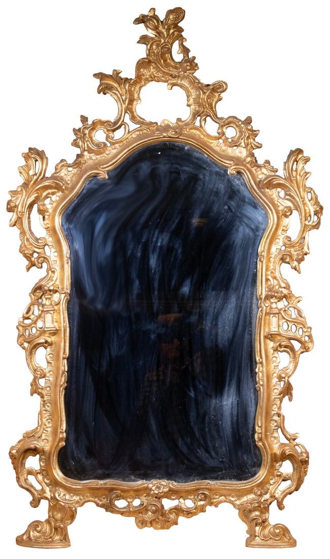 LARGE FRENCH LOUIS XVI GILTWORK MIRROR: LARGE FRENCH LOUIS XVI GILTWORK MIRROR BaroqueI Style Well Carved in Deep Relief, asymmetrical, reticulated, scroll and blossom pattern, conforming grey mirror glass. Repair to crest. OS: 58 x 37 x 6 