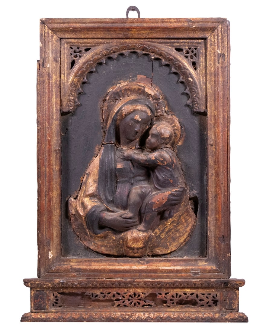 RENAISSANCE PLAQUE, BLACK MADONNA, SOUTHERN FRANCE: RENAISSANCE PLAQUE, BLACK MADONNA, SOUTHERN FRANCE Ca. 1500-1600 AD, carved and parcel-gilt wood, with black pigment, having an arch above and a pediment below, Moorish-influenced reticulated tracery 