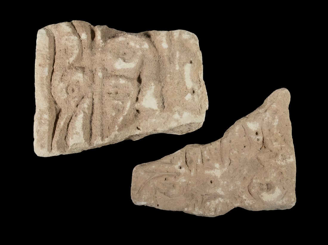 (2 PCS) ANCIENT ASSYRIAN SANDSTONE RUBBLE: (2 PCS) ANCIENT ASSYRIAN SANDSTONE RUBBLE Probably Nimrud origin, engraved relief with drilled holes, both geometric forms, irregular profiles. Located 19 mi SE of Mosul, sacked 610 BC. LGST: 9 x 7