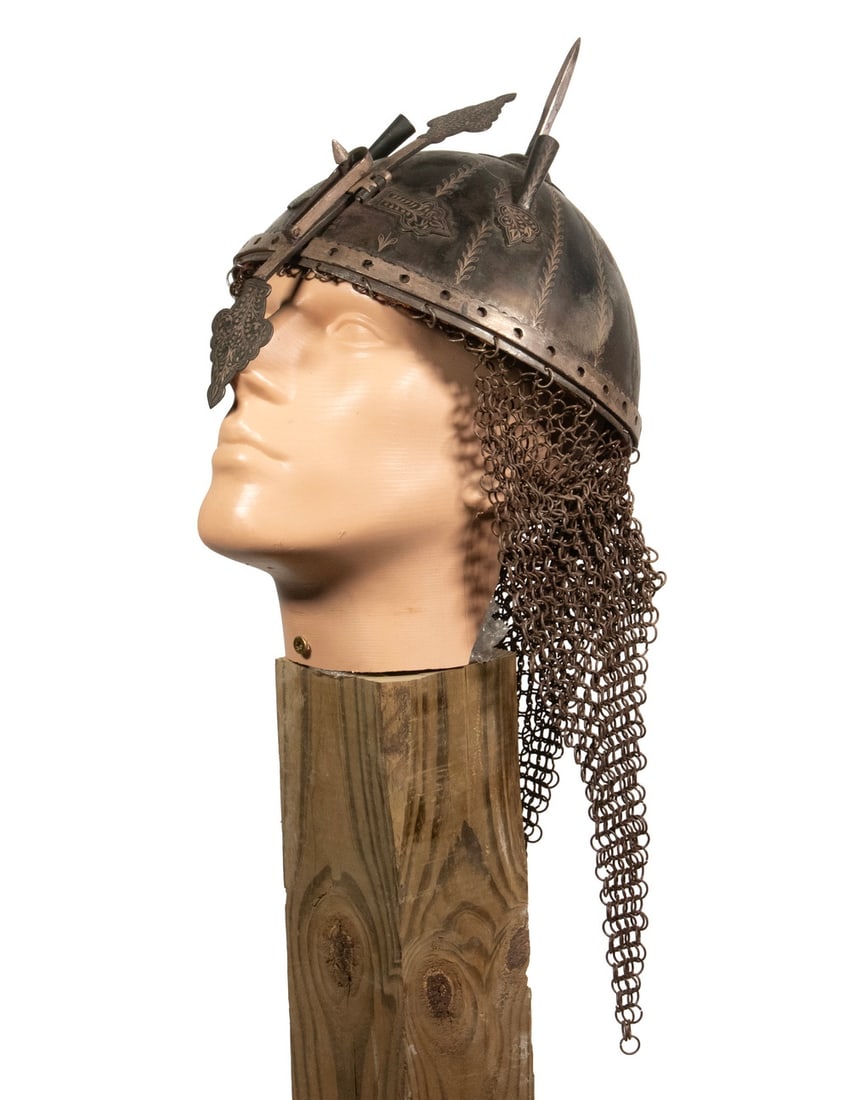 19TH C. PERSIAN QAJAR HELMET: 19TH C. PERSIAN QAJAR HELMET Khula Khud in steel with niello silver, chain mail neck guard, adjustable nose guard, two feather mounts, spiked crown, lined with wine fabric. OS Less Mail: 8 x 9 1/2 x