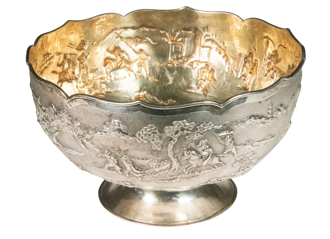 CHINESE EXPORT SILVER PUNCH BOWL: CHINESE EXPORT SILVER PUNCH BOWL Late 19th - Early 20th c. Footed Bowl, with continuous repousse decoration of mounted warriors and other figures in landscapes, scalloped rim, set on a flared foot,