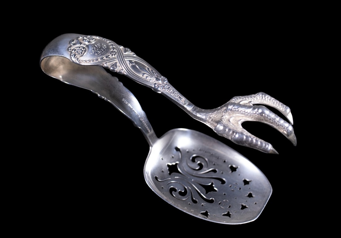 TIFFANY & CO. "ST. JAMES" PATTERN STERLING ICE TONGS: TIFFANY & CO. "ST. JAMES" PATTERN STERLING ICE TONGS Pair of Large Silver Ice Serving Tongs by Tiffany & Co., St. James pattern, beautifully formed and chased with engraved script monogram. 3.44 ozt.