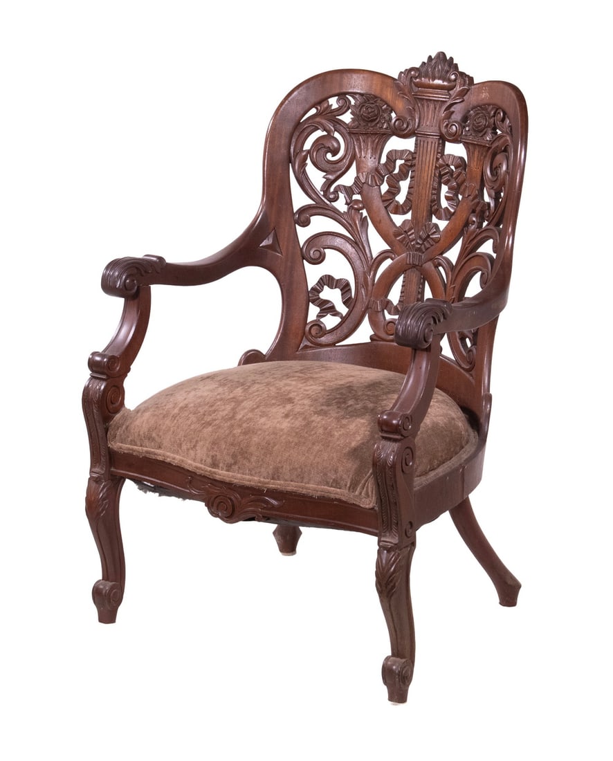 VICTORIAN LAMINATED ROSEWOOD GENT'S CHAIR: PLATINUM AND DIAMOND THREE STONE RING A platinum three stone diamond ring set with a central round brilliant-cut diamond weighing approximately 0.73 carat, graded H color and SI1 clarity according to