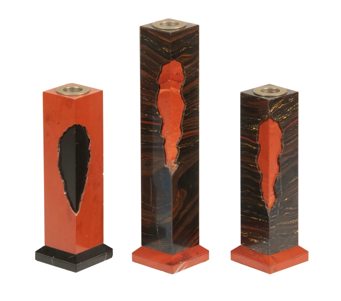 (3) KARL SPRINGER (NY, 1931-1989) STONE CANDLE HOLDERS: (3) KARL SPRINGER (NY, 1931-1989) STONE CANDLE HOLDERS Group of (3) American Designer Candlesticks, circa 1980s, in red jasper and marble with chromed metal inserts, by listed designer Karl Springer.