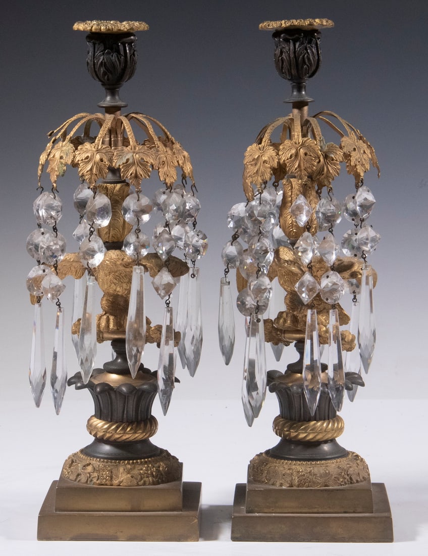 PR BRONZE EAGLE LUSTRES: PR BRONZE EAGLE LUSTRES Pair of 19th century French Figural Candleholders, in gilded and patinated bronze, each stem depicting a perched spread wing eagle, with cast "branches" suspending faceted pris