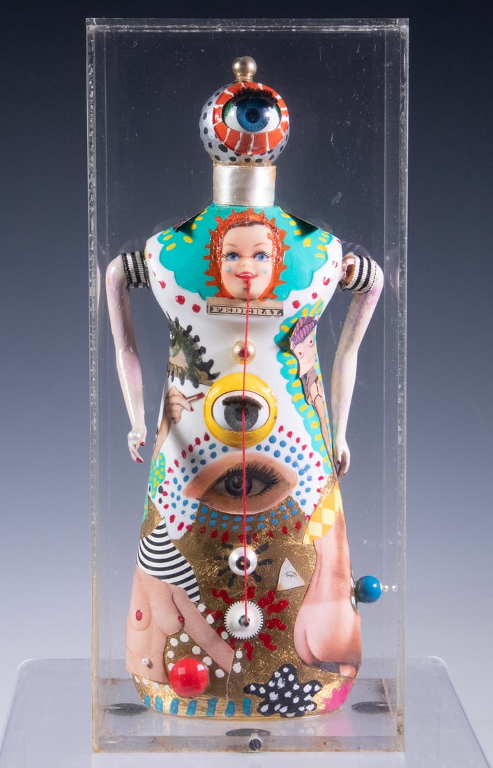 CONTEMPORARY ASSEMBLAGE, ARTIST UNKNOWN: CONTEMPORARY ASSEMBLAGE, ARTIST UNKNOWN Modern Surrealist Figure based on dish soap bottle, with clipped collage and object appliques, including a single eye as head, unsigned. In plexi box. OS: 11 1/