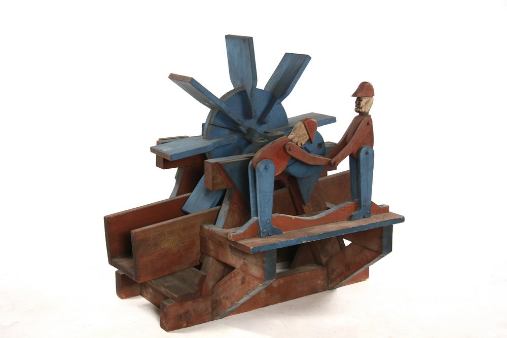 FOLK ART WATER WHEEL - Water wheel whirligig with two: FOLK ART WATER WHEEL - Water wheel whirligig with two lumberjacks turning the crank, from Pownal, Vermont, ca 1940, in blue and red paint, approx. 30" tall, 28 1/2" wide, 38" long, good weathered cond