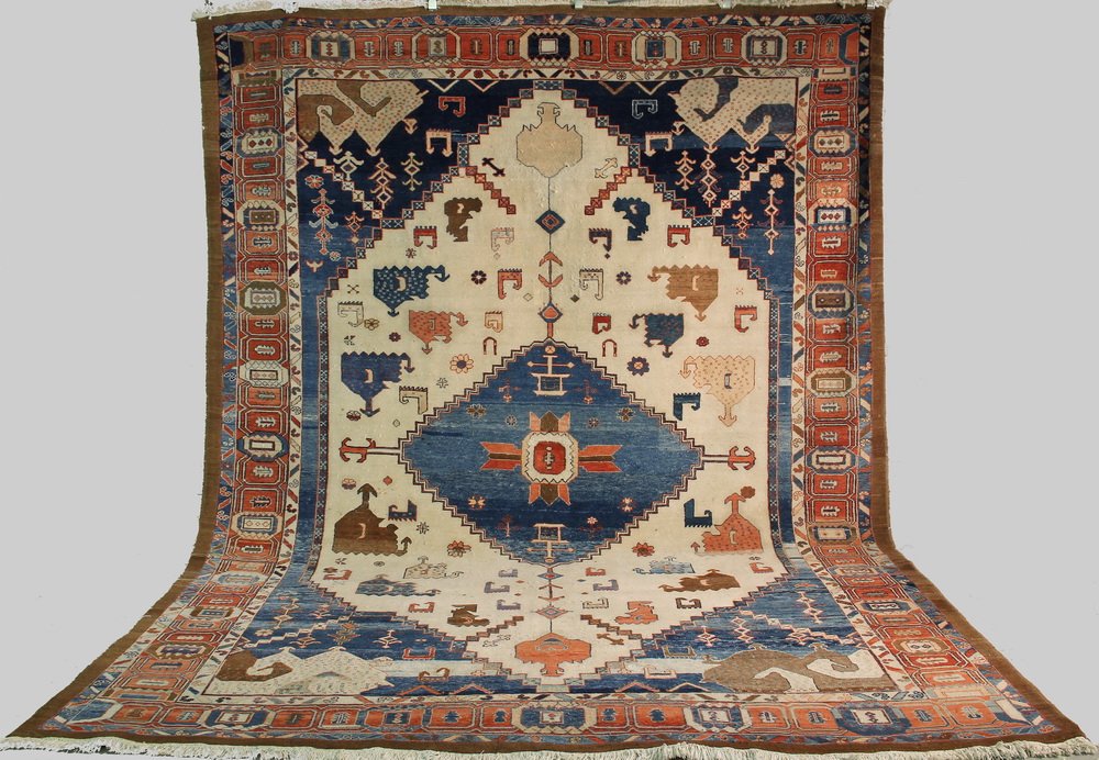 PERSIAN CARPET - 9'7" X 13' - Northwest Persia, mid: PERSIAN CARPET - 9'7" X 13' - Northwest Persia, mid 20th c, stepped diamond abrashed sky blue medallion, set on an ivory field, decorated with birds and rosettes, abrashed blue spandrels, brown and ta