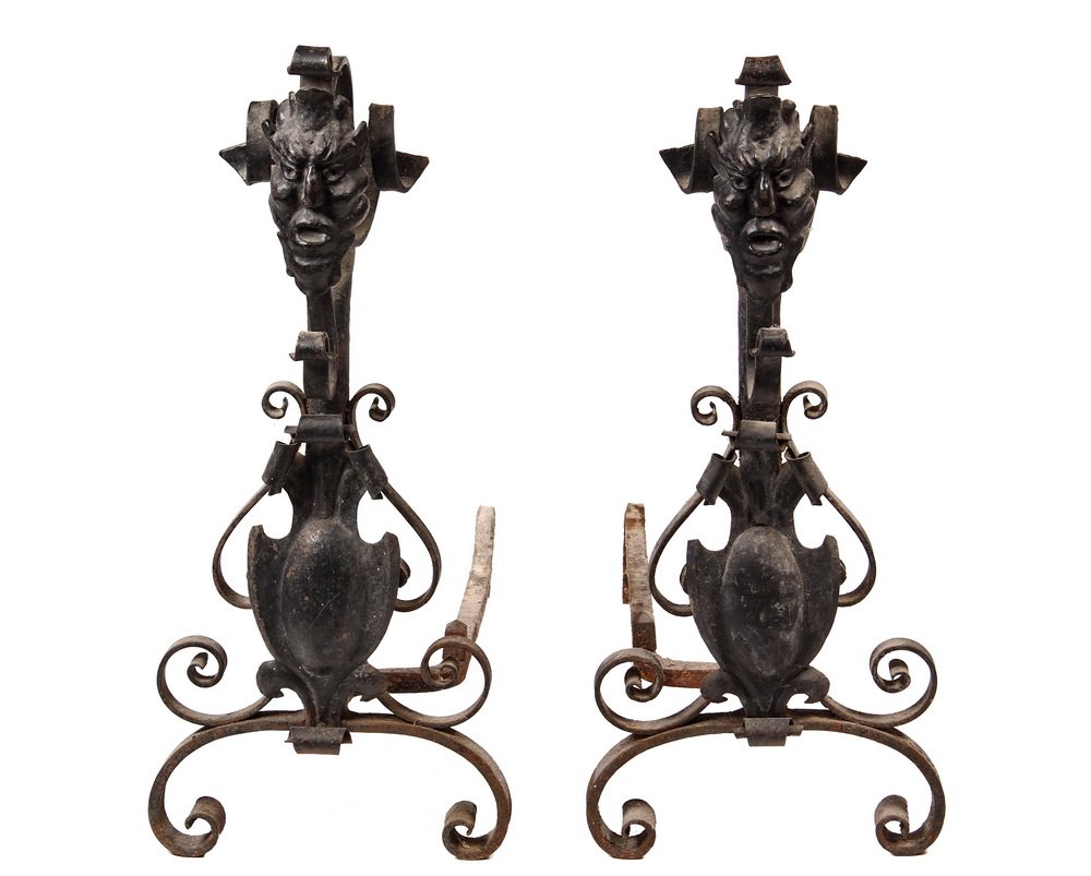 BELLE EPOCH ANDIRONS - Wrought Iron Scrollwork: BELLE EPOCH ANDIRONS - Wrought Iron Scrollwork supporting hammered faces of Mephistopheles, shield below, in black paint. Property of Helen Temple Cooke of Wellsley fame. 27" x 12" x 25". Some corrosi