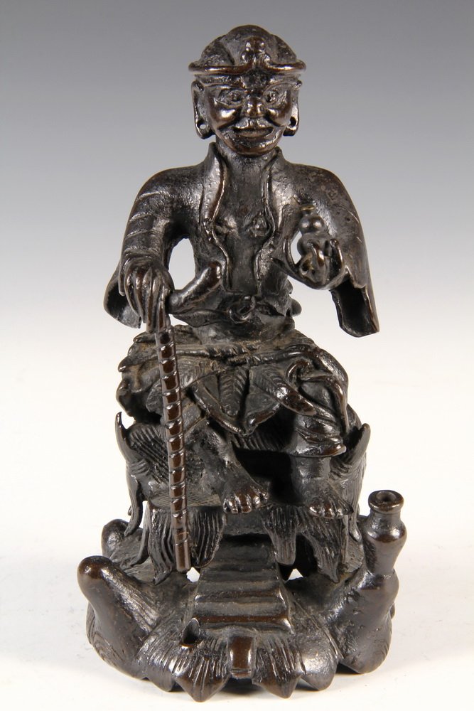 JAPANESE BRONZE FIGURINE - Edo Period Figure of an Oni: JAPANESE BRONZE FIGURINE - Edo Period Figure of an Oni Yara, or exorcism demon, enthroned, with attributes. Signed on base. 6 3/4" tall. Fine condition, warm dark patina.