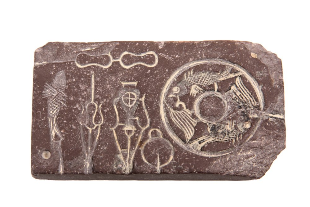 CHINESE RELIEF CARVED STONE - Han Dynasty Hardstone: CHINESE RELIEF CARVED STONE - Han Dynasty Hardstone Gold Jewelry Casting Mold with a total of thirteen figures, one large bi disc form with two fish. Also, running horse, bird, cloud & pearl. 2 1/2" x