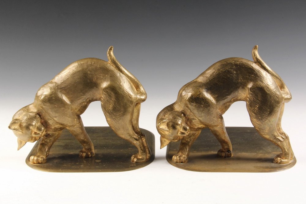TIFFANY BOOKENDS - Gilt Bronze Bookends of Stalking: TIFFANY BOOKENDS - Gilt Bronze Bookends of Stalking Cats, marked 'Tiffany Studios, New York'. Circa 1910. 6 1/4" tall. Some wear to gilding.