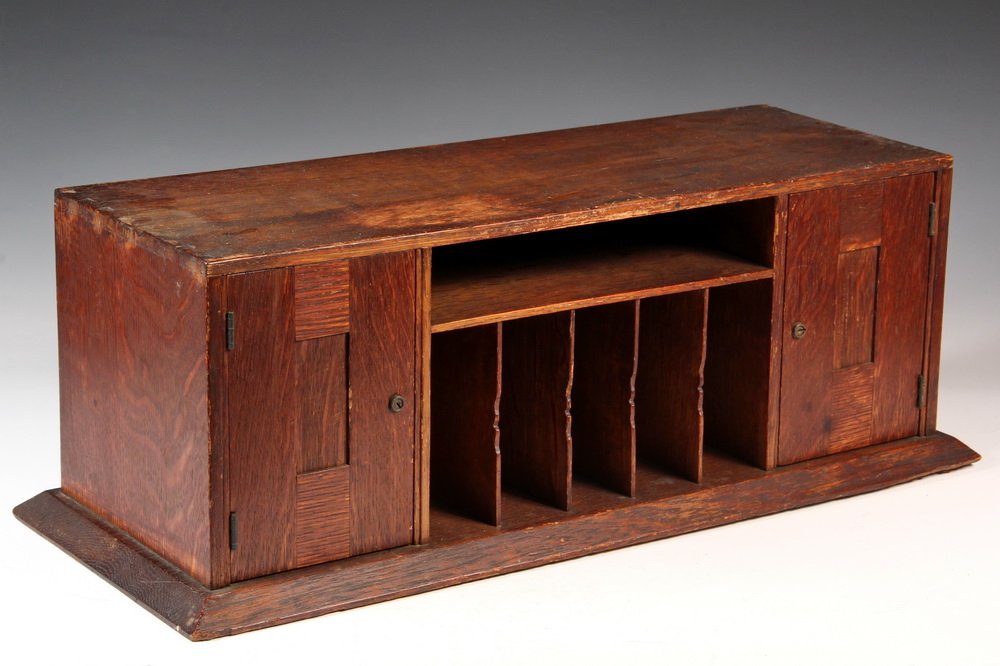 RARE DESK PIGEONHOLES - Arts & Crafts Desktop Cabinet: RARE DESK PIGEONHOLES - Arts & Crafts Desktop Cabinet in quarter sawn golden oak, possibly Stickley, with five center vertical cubbies having a slight carving to edge, shelf above, flanked by locking 