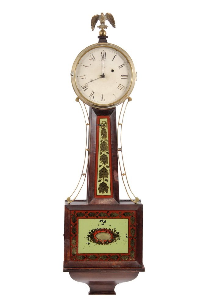 PERIOD BANJO CLOCK - Unmarked early 19th c Banjo Clock: PERIOD BANJO CLOCK - Unmarked early 19th c Banjo Clock with oak leaf eglomise panels, painted tin dial, mahogany case surmounted by brass eagle, having brass side arms, with original pendulum. 36" tal