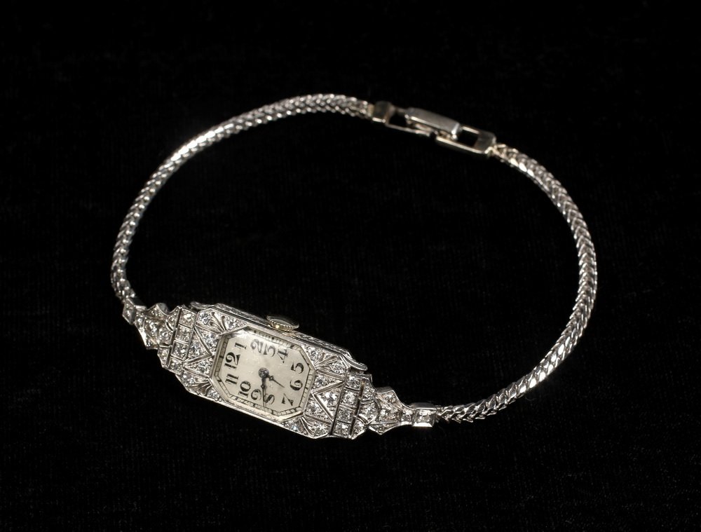 WRISTWATCH - Lady's Edwardian Period platinum and: WRISTWATCH - Lady's Edwardian Period platinum and diamond dress watch by A. Piguet. 7 1/2" long, 1/2" wide. Good as found condition, not running, monogrammed on back of case.