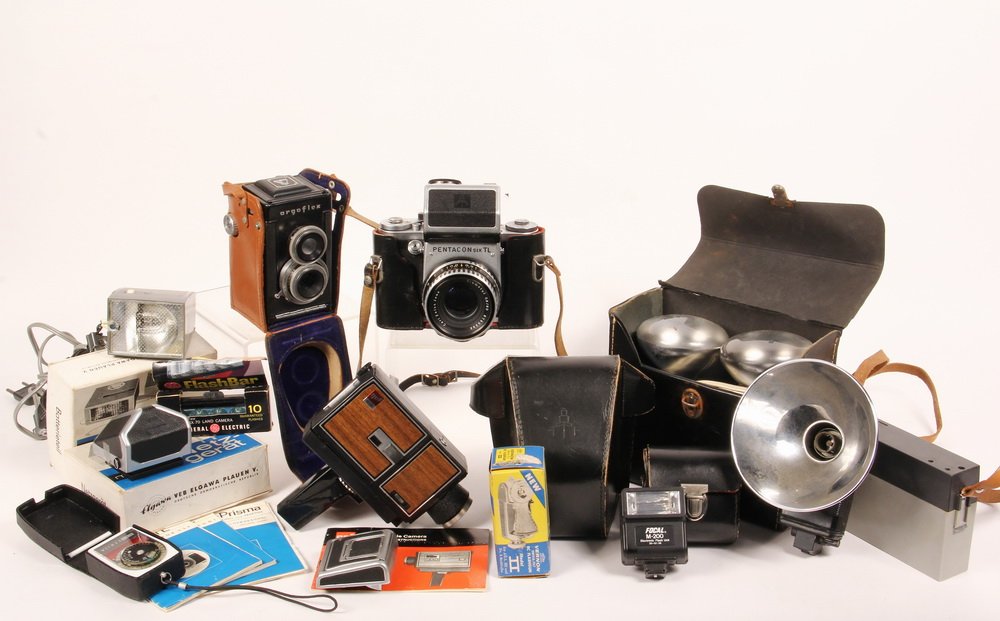 CAMERA LOT - Pentacon 6 TL, ser no 45963 (1958), DRG,: CAMERA LOT - Pentacon 6 TL, ser no 45963 (1958), DRG, with Zeiss Jena Biometar 80 mm/2.8 lens ser no 8760302, original case, with meter; PLUS Pentaflex with case, multiple flash & meter units.