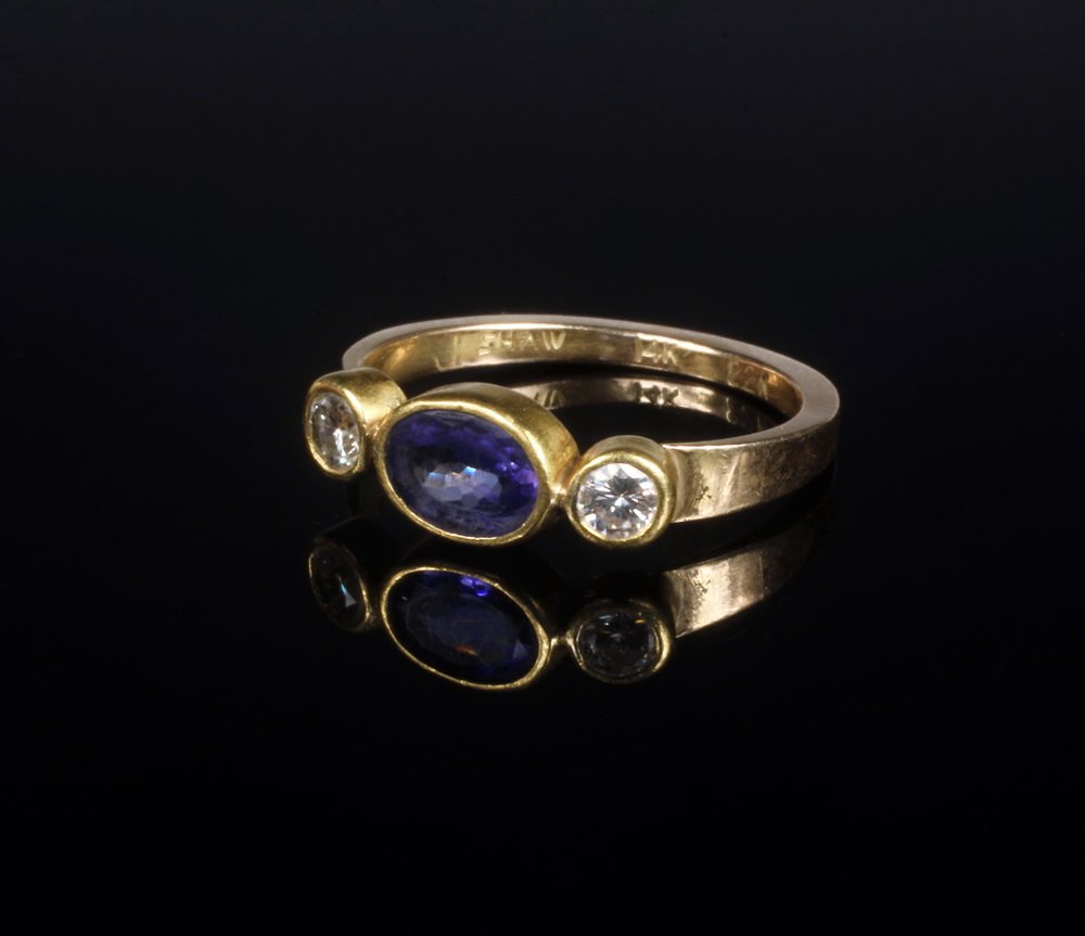 LADY'S RING - 22K, 18K Yellow Gold, Sapphire and: LADY'S RING - 22K, 18K Yellow Gold, Sapphire and Diamond Three Stone Ring, handmade by Sam Shaw, Northeast Harbor, ME. Centered by (1) oval blue sapphire flanked by round brilliant cut diamonds. (1) O