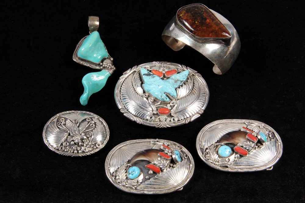 NATIVE AMERICAN & MEXICAN JEWELRY - (6) Pieces of: NATIVE AMERICAN & MEXICAN JEWELRY - (6) Pieces of Finely Crafted Sterling Jewelry, most set with semi-precious stones, including (4) belt buckles, (1) pendant, and (1) bracelet. The belt buckles inclu