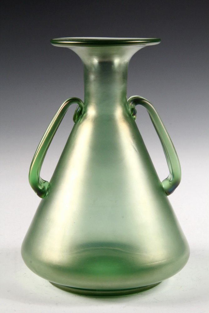 LOETZ ART GLASS VASE - Beaker-Form Iridescent Green: LOETZ ART GLASS VASE - Beaker-Form Iridescent Green Vase with two handles and large flat rim, circa 1900. Unmarked, ground pontil. 9 3/4" tall, 6 1/2" diam. Fine condition.