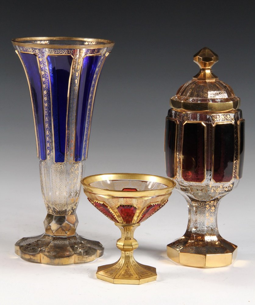 (3 PCS) MOSER GLASS - All late 19th c, including: 9": (3 PCS) MOSER GLASS - All late 19th c, including: 9" Trumpet Vase, blue panels; 9" Covered Beaker, amethyst panels; 4" Sherbet Cup, crimson panels. Very good condition.