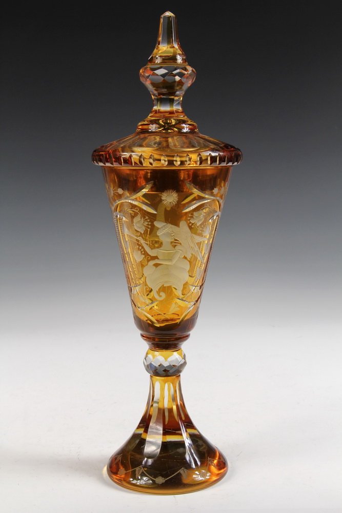 ART GLASS POKAL - Bohemian Amber Cut to Clear Covered: ART GLASS POKAL - Bohemian Amber Cut to Clear Covered Goblet with etched decoration of Angel Gabriel on front, Horn of Plenty on back, large knopped lid. Circa 1900. 14 1/4" tall. Fine condition.